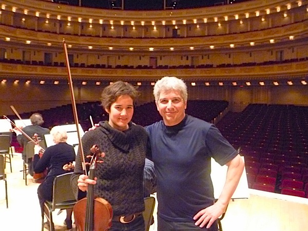 Musician and Classical 96 FM host Kathleen Kajioka with conductor Peter Oundjian during a Toronto Symphony Orchestra rehearsal break at Carnegie Hall in 2011 (Kathleen Kajioka photo).
