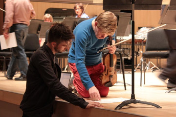 Composer Owen Pallett and Violinist Pekka Kuusisto, rehearsing his violin concerto  co-commissioned by the Barbican and the Toronto Symphony Orchestra.