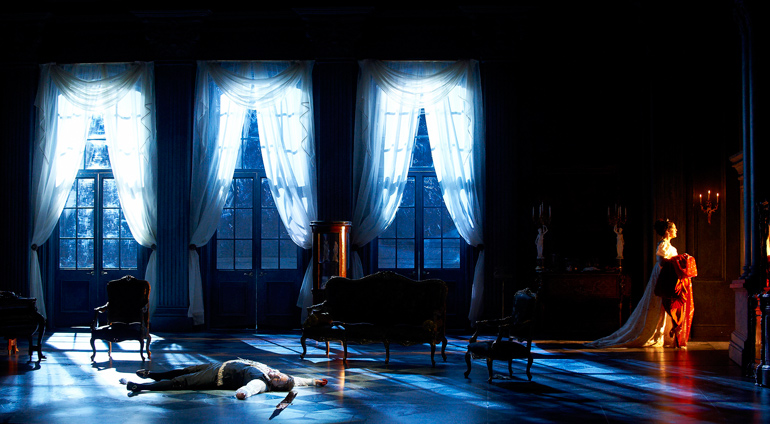 Mark Delavan as Scarpia and Adrianne Pieczonka as Tosca in Tosca (COC, 2012), (Photo: Michael Cooper)