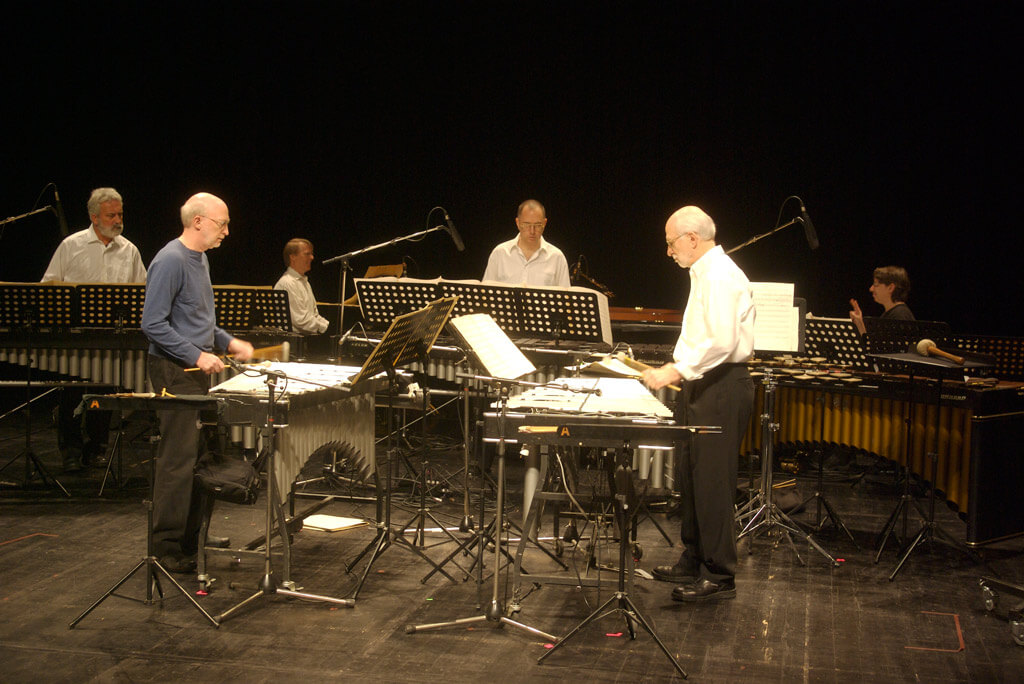 Steve Reich Ensemble rehearsing Sextet, Le Havre, France. From Left, Garry Kvistad, Bob Becker, Edmund Niemann, Thad Wheeler, Russell Hartenberger, and Nurit Tilles (Photo: Flickr.com)