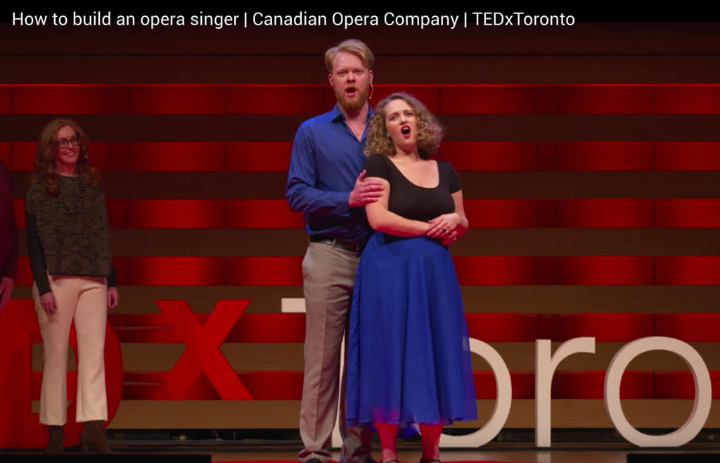 Soprano Danika Lorèn and baritone Iain MacNeil sing during TEDxToronto talk.