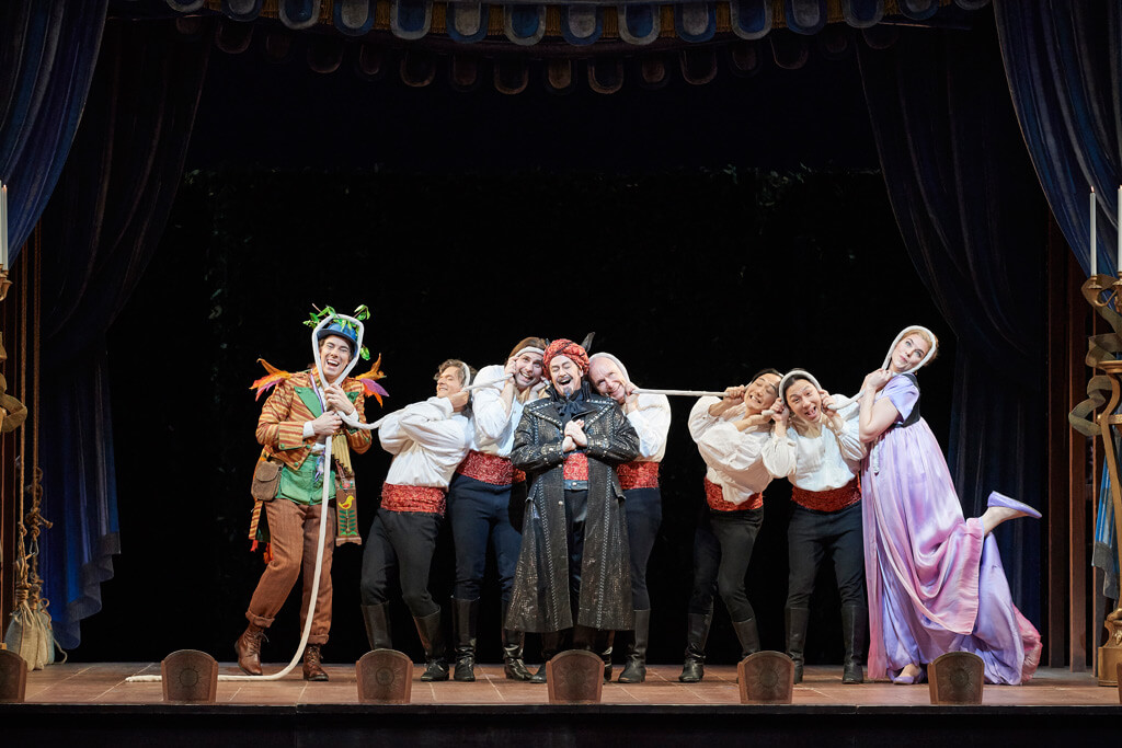 Phillip Addis as Papageno (far left), Michael Colvin as Monostatos (centre) and Kirsten MacKinnon as Pamina in the Canadian Opera Company's production of The Magic Flute, 2017. (Photo: Michael Cooper)
