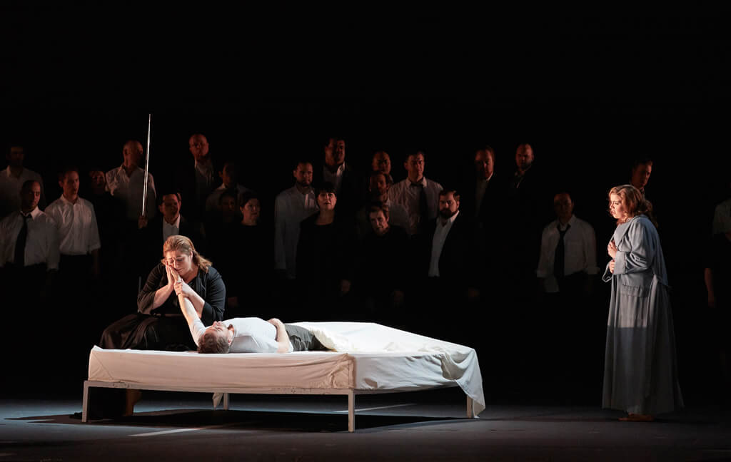 (l-r, foreground) Christine Goerke as Brünnhilde, Andreas Schager as Siegfried and Ileana Montalbetti as Gutrune in the Canadian Opera Company’s production of Götterdämmerung, 2017. (Photo: Michael Cooper)