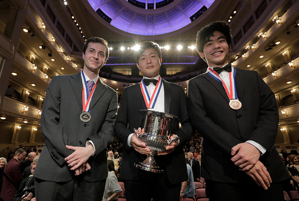 Silver medalist Kenneth Broberg, left, of the United States, gold medalist Yekwon Sunwoo, center, of South Korea and bronze medalist Daniel Hsu, right, of the United States, pose after receiving their awards at the 15th Van Cliburn International Piano Competition. (Photo: Ralph Lauer)