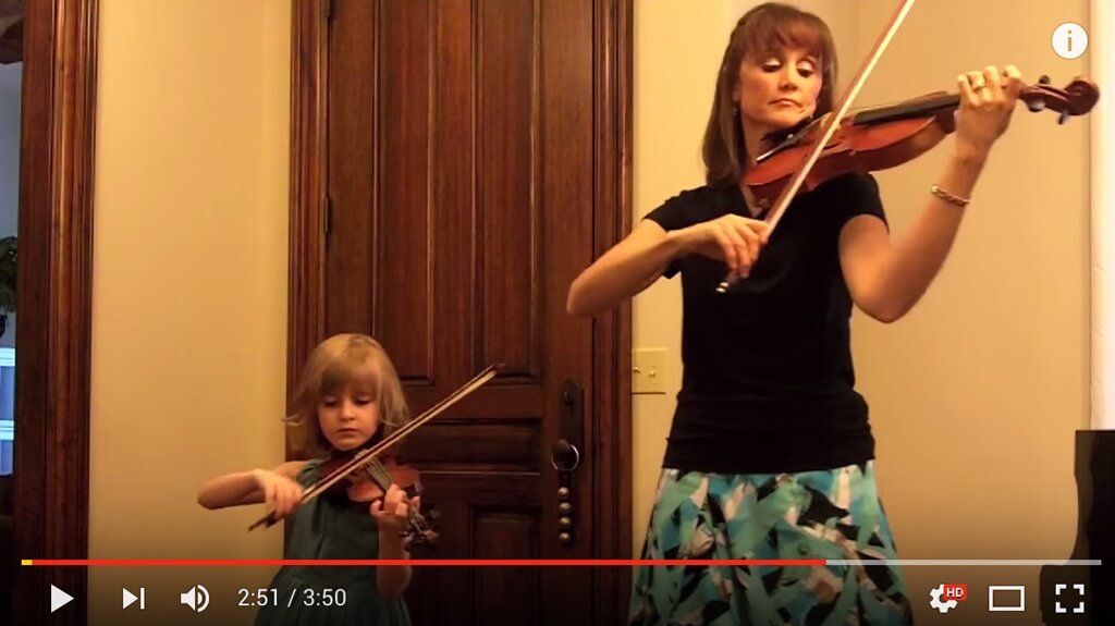 Mother and daughter play a Bach double concerto.