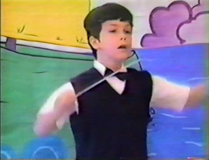 10-year-old Yannick Nézet-Séguin conducts during an elementary school performance.
