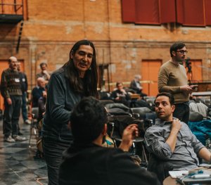 (l-r) Billy Merasty (Poundmaker) talking to Charles Sy (Ambroise Lépine), seen from behind, and Jean-Philippe Fortier-Lazure (Sir George-Étienne Cartier/Father André) in a rehearsal of Harry Somers’ Louis Riel at the Canadian Opera Company’s Imperial Oil Opera Theatre at the Joey and Toby Tanenbaum Opera Centre, March 30, 2017. (Photo: Sam Gaetz)