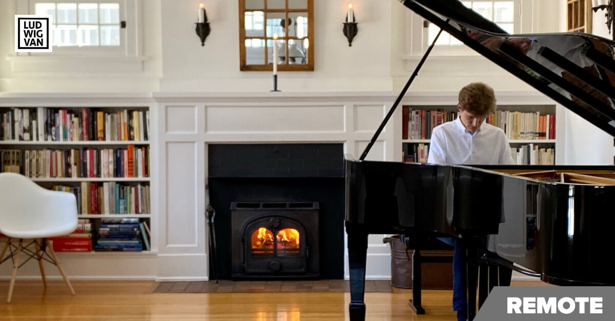 Photo of Jan Lisiecki working on repertoire at his home while self-isolating during COVOD-19 pandemic (Courtesy of the artist)
