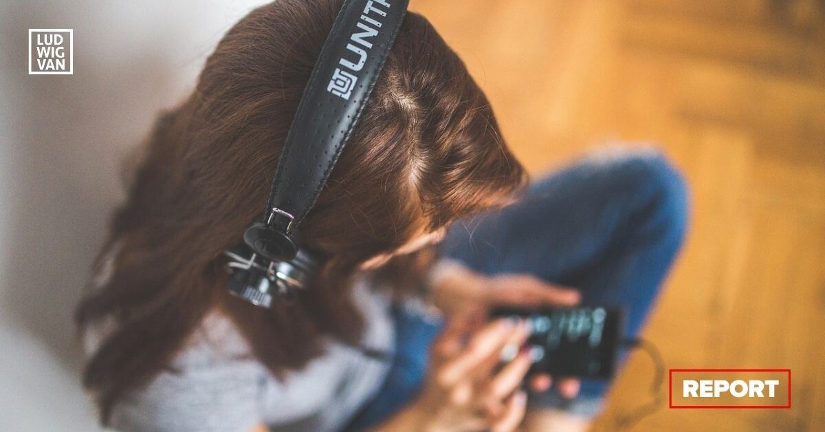 Girl listening to music on her phone