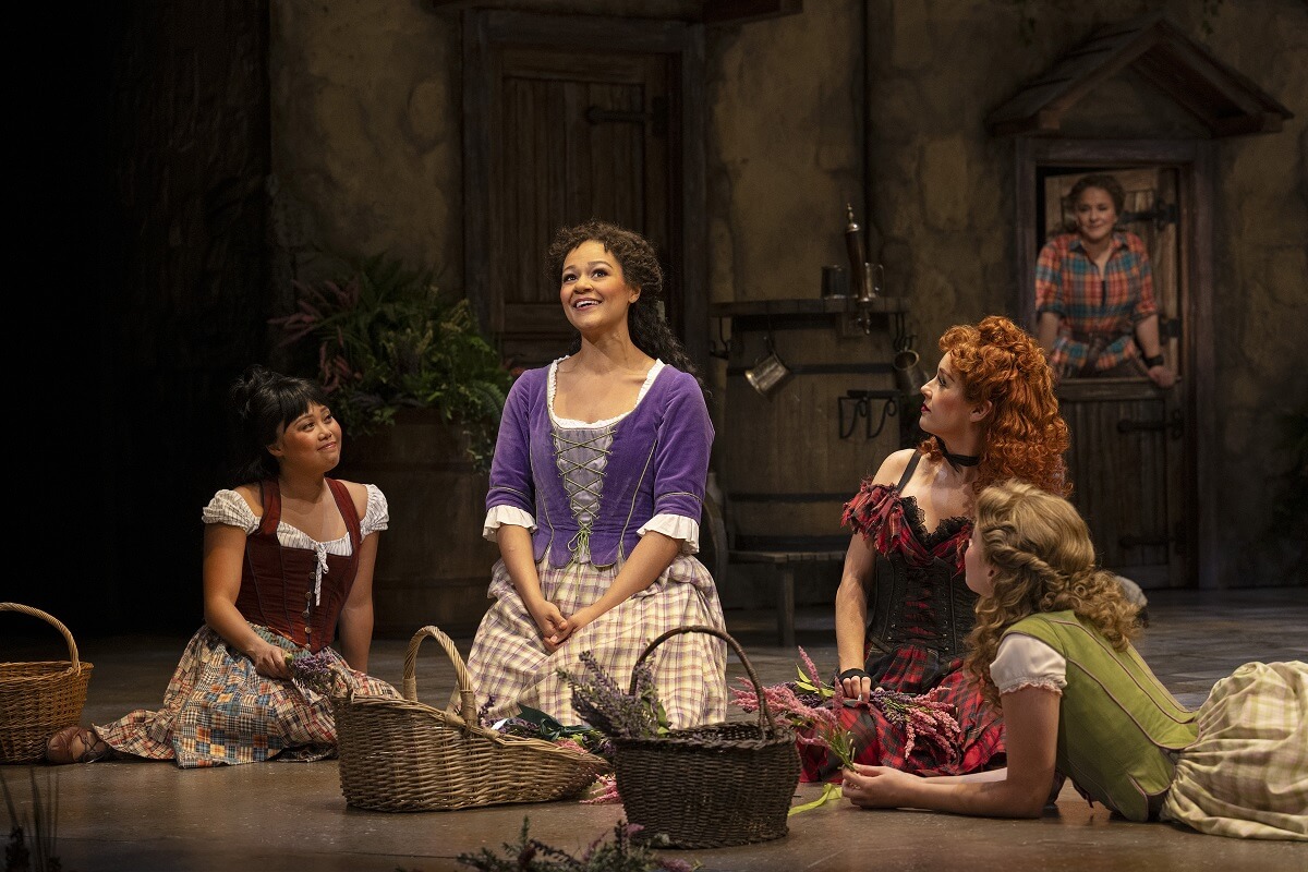 Genny Sermonia as Maggie Anderson, Alexis Gordon as Fiona MacLaren, Kristi Frank as Meg Brockie, Madelyn Kriese as Jean MacLaren, with Jenny L. Wright as Aileen MacFarlane in Lerner and Loewe’s Brigadoon (Shaw Festival, 2023) (Photo: David Cooper)