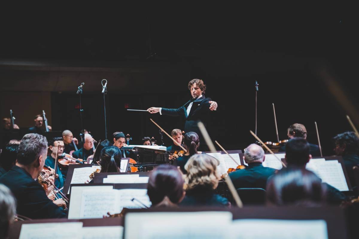 Gustavo Gimeno conducting the TSO in November 2024 (Photo: Allan Cabral/Courtesy of the TSO)