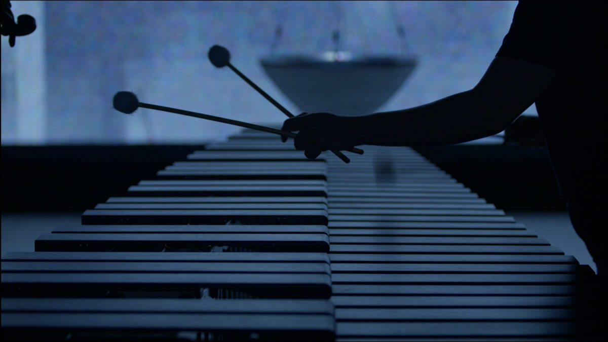 Percussionist Aiyun Huang in The Mystery of Clock (Photo courtesy of the artist)