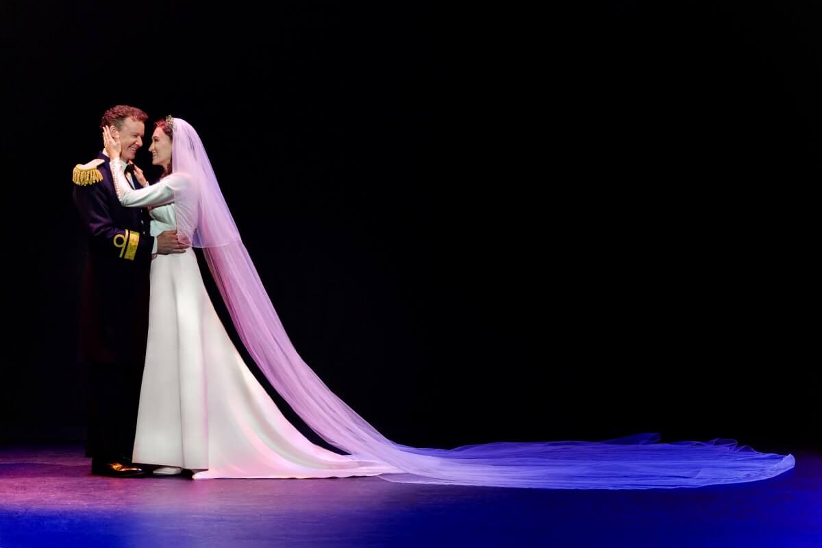 Kevin Earley (Captain Georg von Trapp) and Cayleigh Capaldi (Maria Rainer) in The Sound of Music (Photo: Jeremy Daniel)