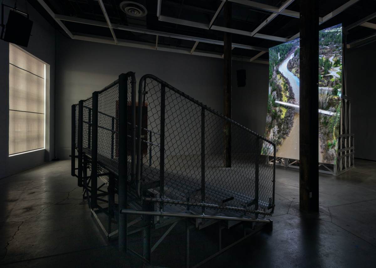 Lucy Raven, Murderers Bar, 2025. Colour video, quadraphonic sound, aluminum andplywood screen, and aluminum seating structure, 41:47. Co-commissioned and jointly acquired by The Vega Foundation and the Vancouver Art Gallery. Courtesy the artist and Lisson Gallery. Installation view: The Power Plant, Toronto, 2025. (Photo: LF Documentation)