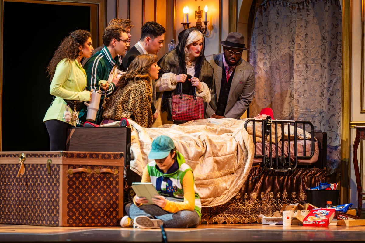 Right to Left, in background: Daniela Carreon Herrera, Nicholas Kluftinger, Callum Aldworth (partially obstructed), Charlotte Anderson, Jeffrey Liu, Jada Alexiou, Tyler Prince & Kjel Erickson (stand in for Yanik Gosselin). Foreground: Meghan Linnington in the Glenn Gould School Spring Opera 2026 production of Puccini’s Gianni Schicchi (Photo: Dahlia Katz)