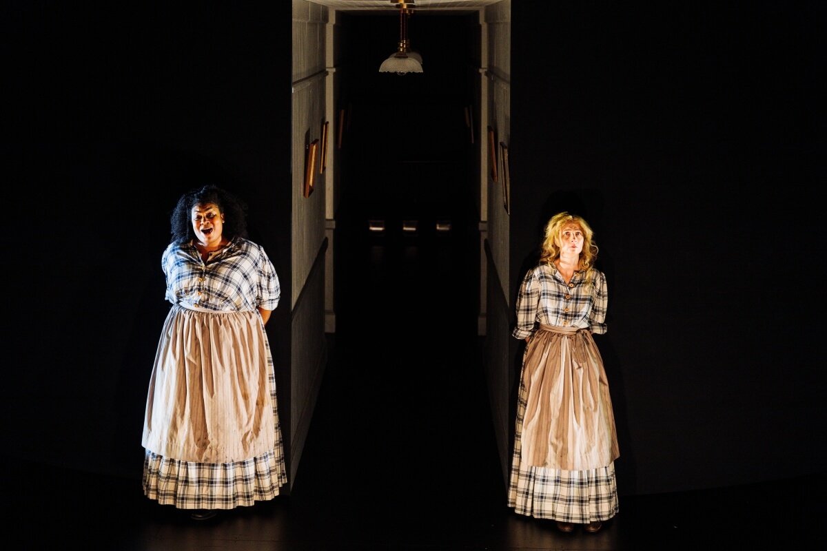 (L-R) Raehann Bryce-Davis as Lizzie and Kiera Duffy as The Madwoman/Nellie in the world premiere of Rene Orth and Hannah Moscovitch’s 10 Days in a Madhouse, Opera Philadelphia (Photo: © Dominic M. Mercier)