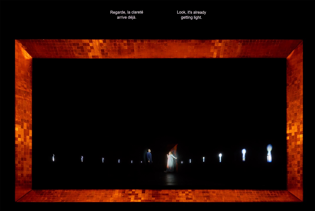 Christian Van Horn as Bluebeard and Karen Cargill as Judith in the Canadian Opera Company’s production of Bluebeard’s Castle, 2026. Conductor Johannes Debus, original director Robert Lepage, revival director François Racine, set and costume designer Michael Levine, lighting designer Robert Thomson, and media effects designer Laurie-Shawn Borzovoy. (Photo: Michael Cooper)