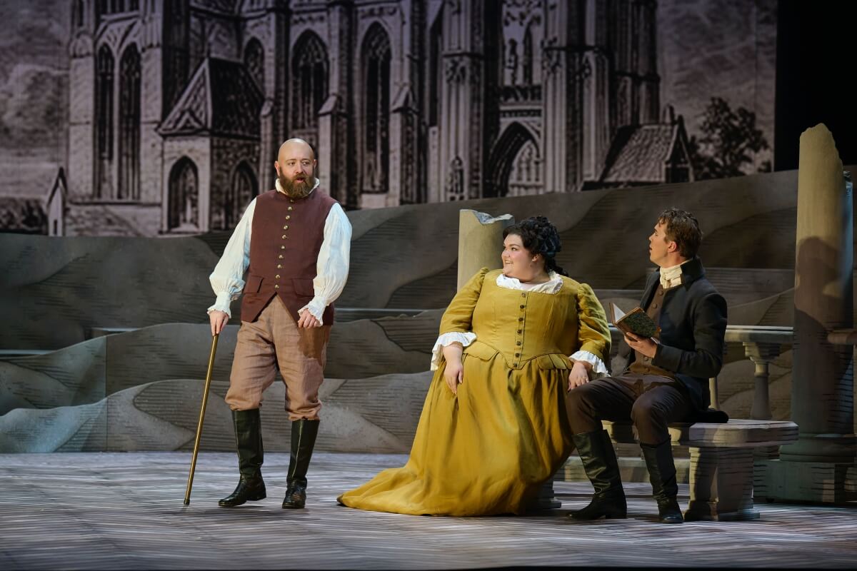 L-R: Robert Pomakov as Le Bailli, Emma Pennell as Käthchen, Ben Wallace as Brühlmann in the Canadian Opera Company’s new production of Werther, 2026 (Photo: © Michael Cooper)