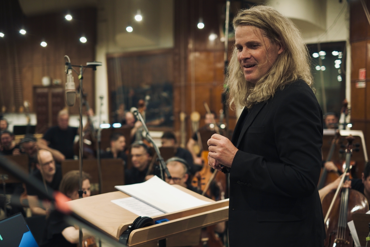 Composer Nathan Henninger in the recording studio with the Budapest Scoring Orchestra (Photo courtesy of the artist)