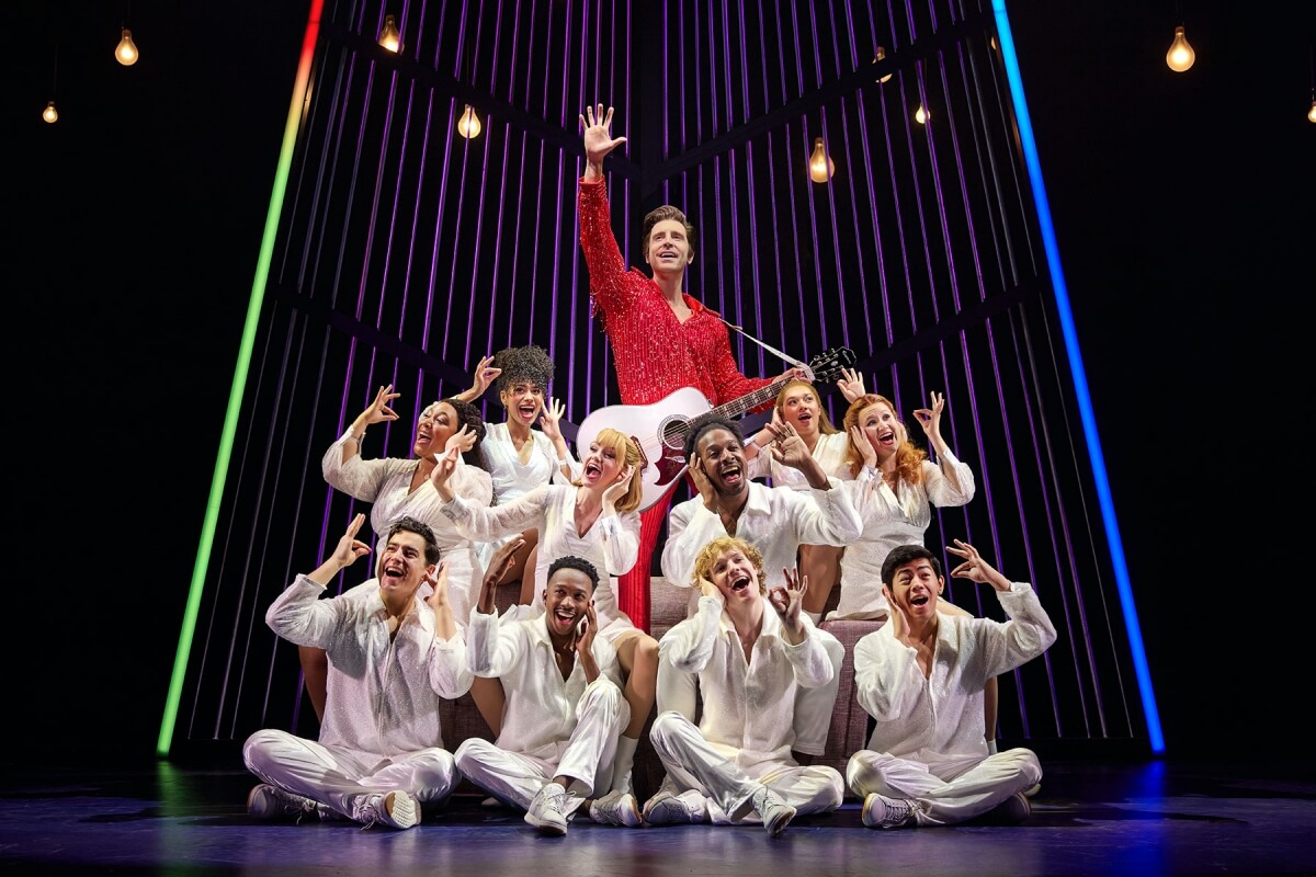 Nick Fradiani as 'Neil - Then' (center) and 'The Noise' in A BEAUTIFUL NOISE: THE NEIL DIAMOND MUSICAL. (Photo: Jeremy Daniel)